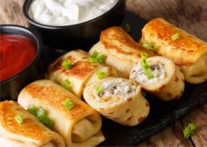 Млинці з курятиною та грибами